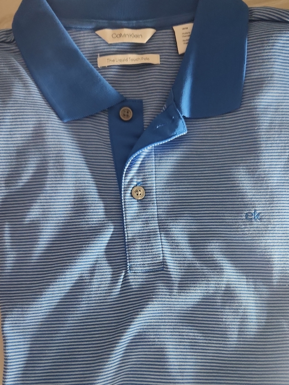 Calvin Klein Light Blue Striped Polo with Solid Blue Collar